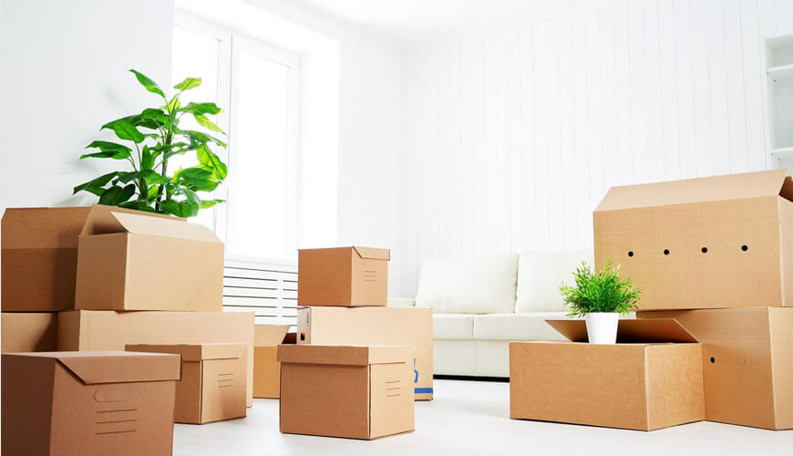 Cardboard boxes in a clean apartment β Move In / Move Out Cleaning Services California